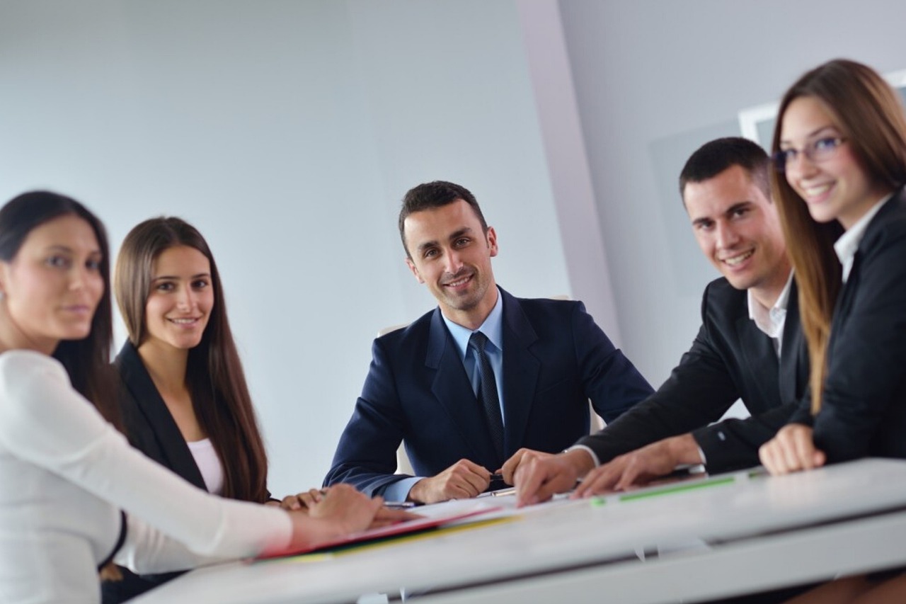 Employer and new finance hire shaking hands
